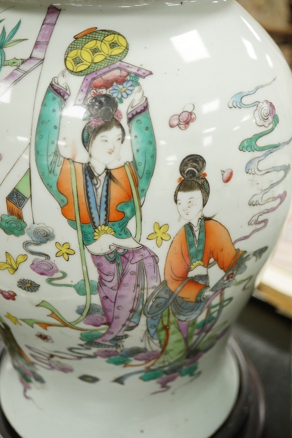 A Chinese famille rose vase and cover on stand, a smaller famille rose vase, vase and cover 50 cm high including stand., Condition - smaller vase in pieces and reglued.